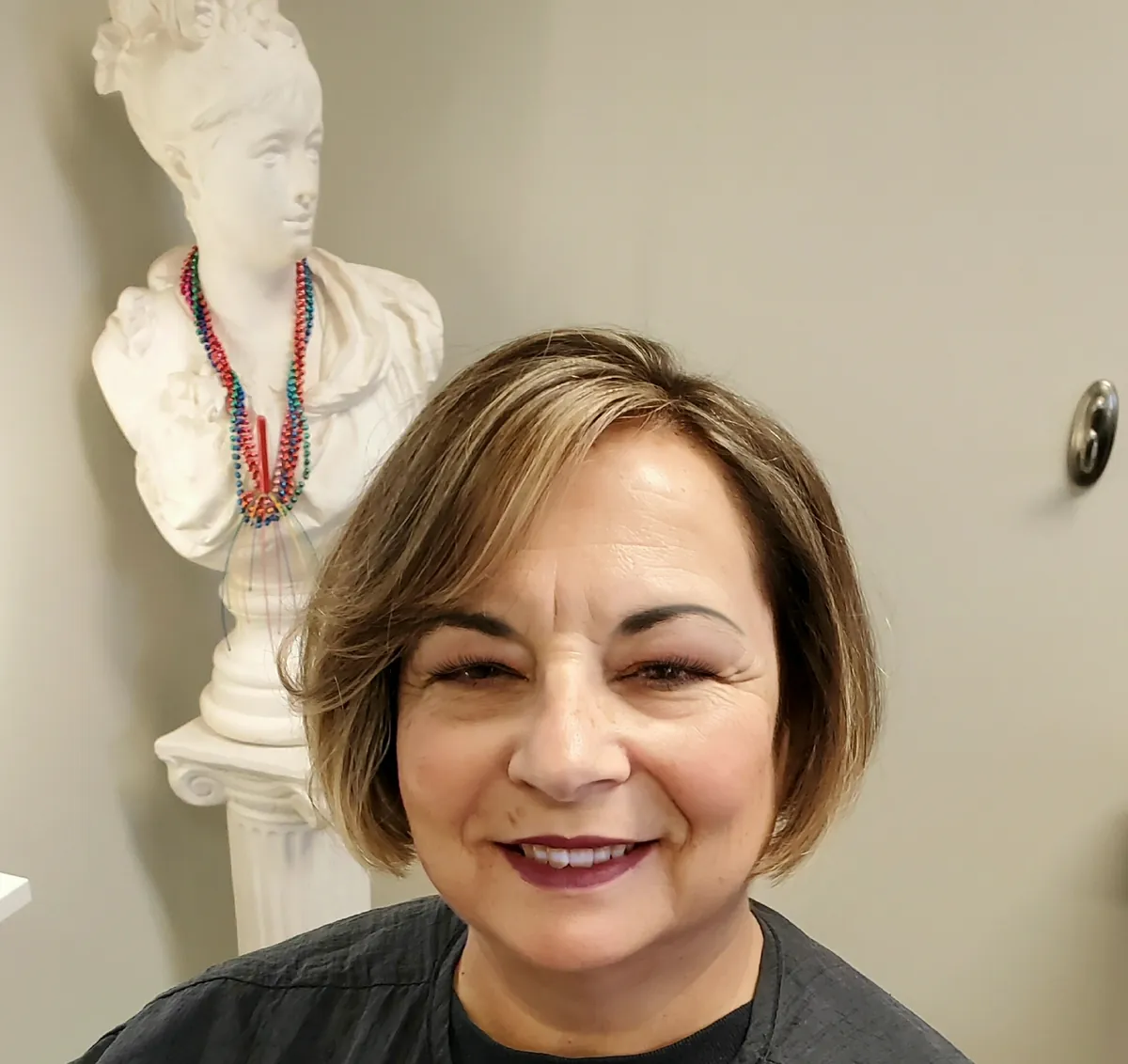 Happy client after a fresh bob cut at Choppers Hair Studio